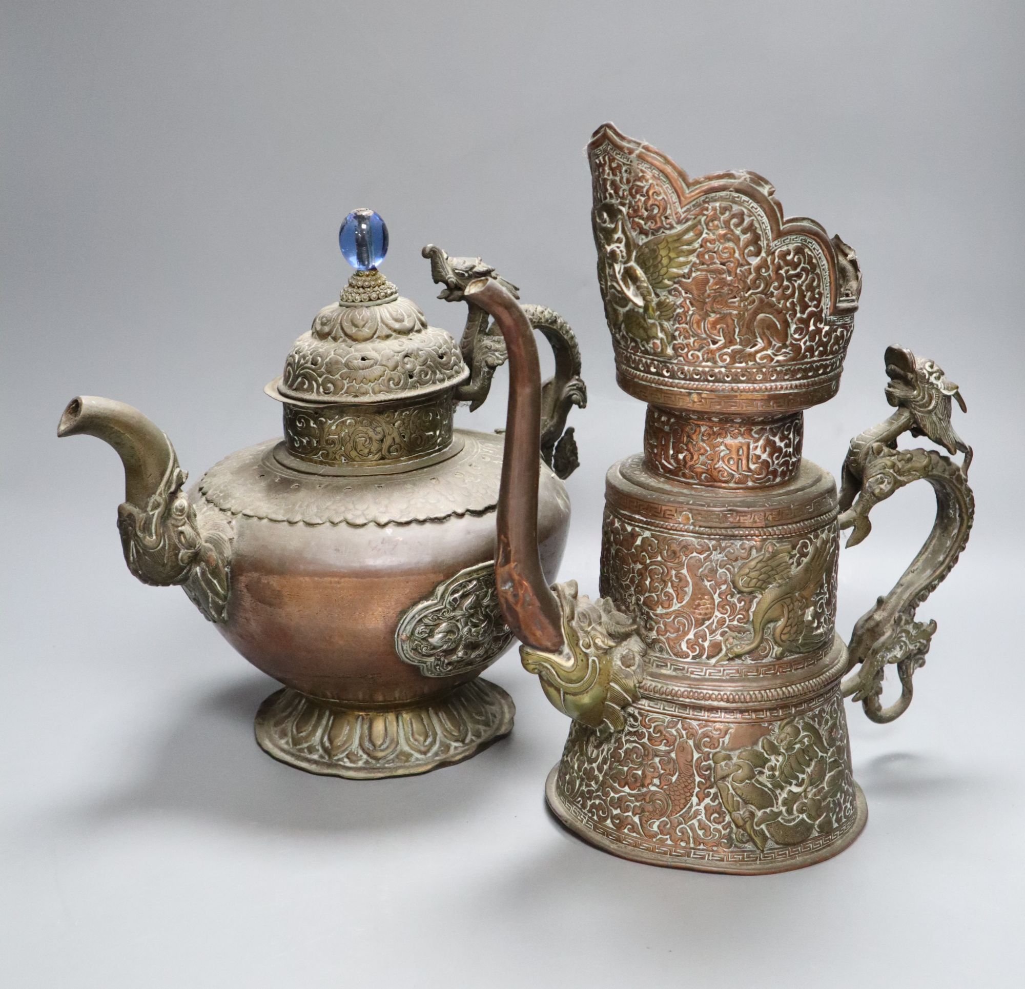 A 19th century Tibetan duomuhu ewer and a teapot, tallest 31cm